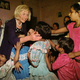 US first lady Hillary Clinton meets children at Mother Teresa’s Sishu Vhavan Orphanage in Calcutta on Sept. 13, 1997 after attending the funeral services for Mother Teresa. The first lady said the charity that Mother Teresa was dedicated to would not end with her death.